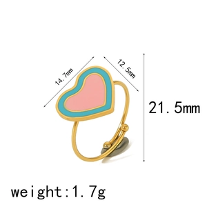 Detail view of heart-shaped gold ring with dimensions and colorful enamel contrast