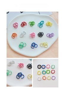 Macro shot of colorful painted metal jump rings for DIY jewelry and keychain accessories