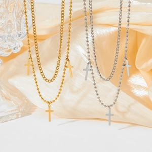 Double-layered hip hop cross necklace set in gold and silver finish with bead chain design