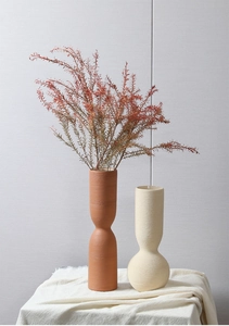 Detail of Nordic ceramic vases with brushed texture and modern minimalist design