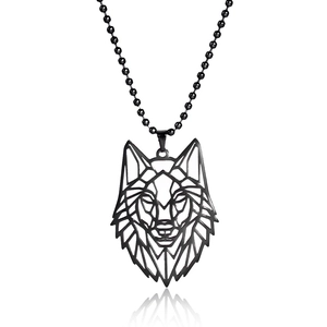 Detailed view of hollow geometric wolf head pendant with black finish on a bead chain