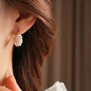 Elegant French vintage style hoop earrings with pave pearls and zircons on gold finish