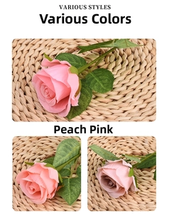 Detail of peach pink artificial rose with realistic fabric petals and green leaves
