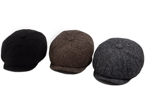 Three wool newsboy caps in black and herringbone tweed patterns for autumn and winter