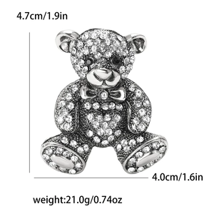 Detailed size chart showing dimensions 4.7cm x 4.0cm of the rhinestone bear brooch