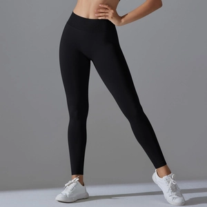 Close-up of black seamless high-waist yoga pants with supportive V-waistband detail
