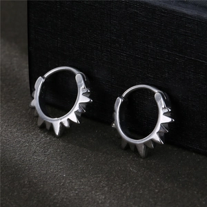 Cyberpunk style silver titanium steel hoop earrings with spiked gear design for men and women