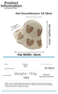 Detail view of foldable paper straw sun hat with dimensions and heart pattern