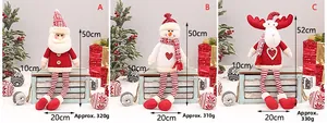 Detailed view of plush Santa, Snowman, and Reindeer dolls with 50cm height dimensions