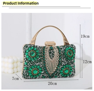 Detailed view of green emerald evening clutch with gold handle and size dimensions