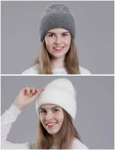 Close-up of thick ribbed knit texture on dark grey and cream rabbit hair beanies