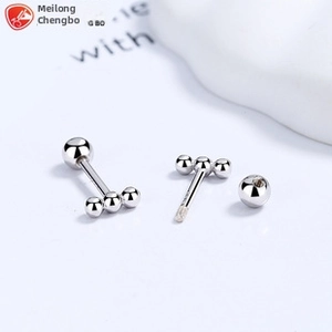Detailed macro view of 925 sterling silver barbell stud earring with three beads design