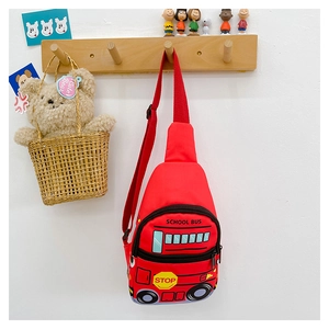 Detail of red school bus shaped kids chest bag with adjustable strap and cartoon print