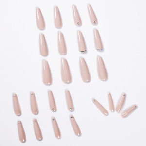 Faux ongles ballerine beige nude avec strass brillants et fini semi-transparent