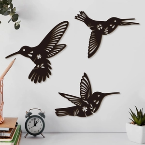 Three-piece hummingbird wall art set in walnut wood finish with laser-cut floral details