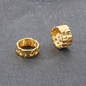 Detail showing gold plated hollow Cuban chain texture rings with metallic luster