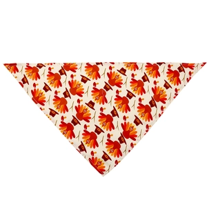 Détail d'un bandana pour animaux avec motifs de dinde et chapeau de pèlerin sur fond beige