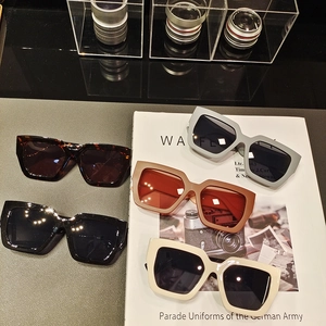 Fashionable oversized square matte sunglasses in black, tortoiseshell and neutral colors