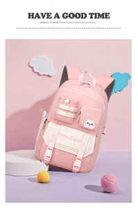 Detailed view of cat theme pink school backpack with cute illustrations and adjustable straps