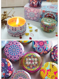 Detailed view of bohemian mandala patterned metal tins for scented soy wax candles