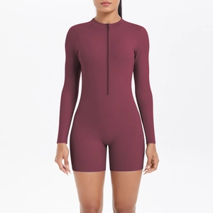 Close-up of wine red long sleeve bodysuit featuring a functional front zipper neckline