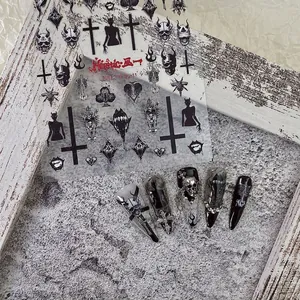 Gothic nail stickers and press-on nails featuring skulls and devil kiss motifs