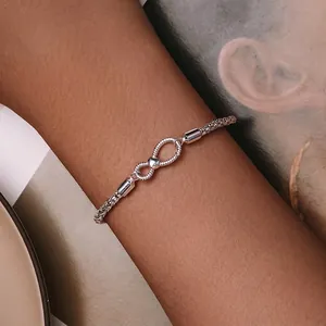 S925 sterling silver infinity bracelet with small heart accent on a snake chain