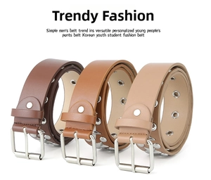 Detail of PU leather belts with silver pin buckles, metal eyelets, and round studs