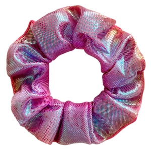 Detailed close-up of handmade pink laser fabric scrunchie with holographic sequin texture