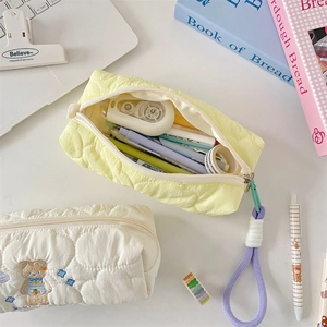 Quilted cotton pencil case detail showing large capacity and cute bear embroidery