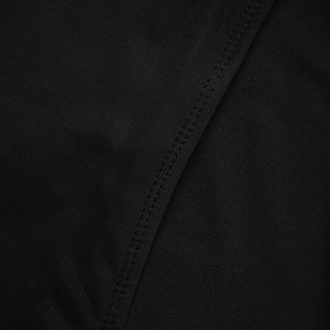 Detail shot of black mesh and knit fabric texture with professional double-needle stitching