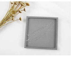 Detailed macro view of S925 sterling silver chain with adjustable extender and round clasp
