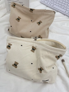 Cute bear corduroy makeup bag in cream and khaki colors for cosmetic storage