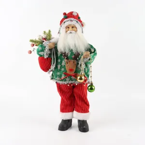 Detailed plush Santa Claus doll in green knit sweater carrying a festive red gift bag