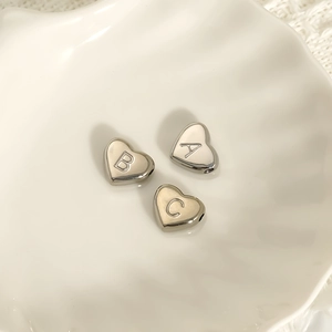 DIY stainless steel heart charms with alphabet engravings for custom jewelry making