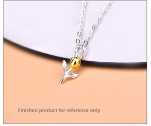 Detailed close-up of a 925 silver tulip pendant featuring dual-tone gold and silver finish