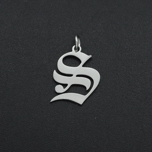 Gothic style stainless steel letter S pendant with metallic silver finish on dark background