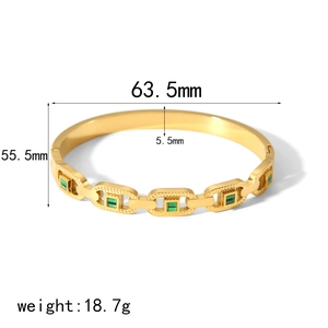 Gold plated stainless steel chain bracelet with green rectangular crystals and openwork