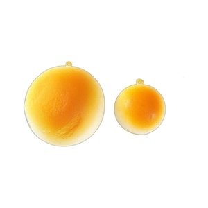 Realistic gold bun slow rebound squishy toy in two sizes with gradient baking texture