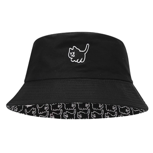 Black cotton bucket hat featuring white cat embroidery and patterned inner lining
