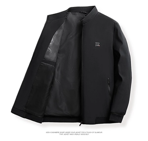 Detail of black stand collar jacket featuring zipper closure and embroidered logo B