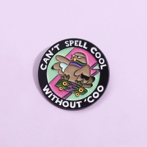 Geometric round enamel pigeon skateboard brooch with COOL text on purple background