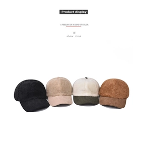 Four corduroy and sherpa patchwork baseball caps in various earthy autumn colors