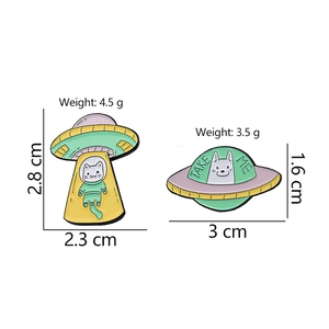 UFO cat enamel pins set featuring alien spaceships and Take Me text in cartoon style