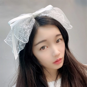 White polka dot mesh bow headband with short veil for wedding and bridal hair styling