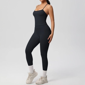 Close-up of black seamless yoga set showing matte high-stretch fabric and slim fit