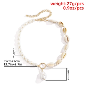 Baroque irregular pearl necklace detail with gold clasp and shell pendant jewelry