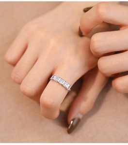 Close-up of minimalist S925 silver ring with five sparkling rectangular cubic zirconia