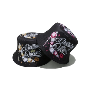 Black cotton bucket hat featuring Birthday Queen print and decorative high heel icons