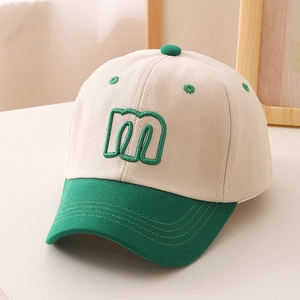 Kids baseball cap with green m embroidery and contrast visor for sun protection